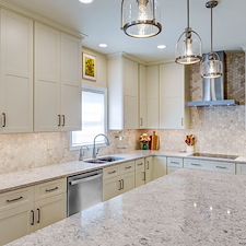 Warm-Creamy-White-Painted-Cabinetry-Paired-Organic-Wood-Grained-Timber-Kitchen-Remodel-in-East-York 7